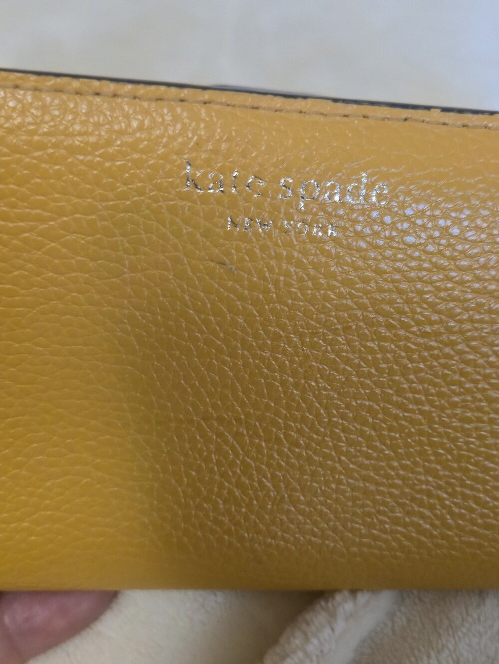 kate spade Yellow Pebbled Leather Slim Wallet